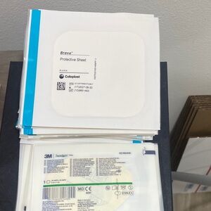 Coloplast Brava Protective Sheet 30 & 3M tegaderm  25 - White with Teal Accent